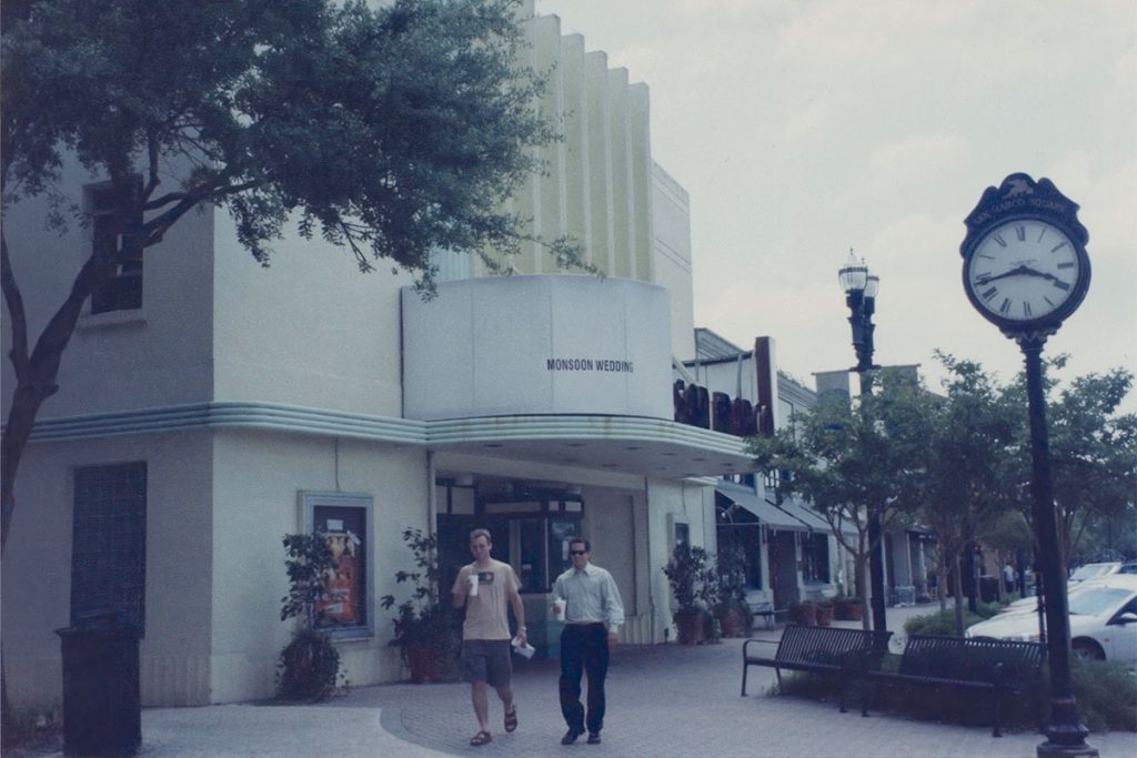The side view of San Marco Theatre and the San Marco Square clock.