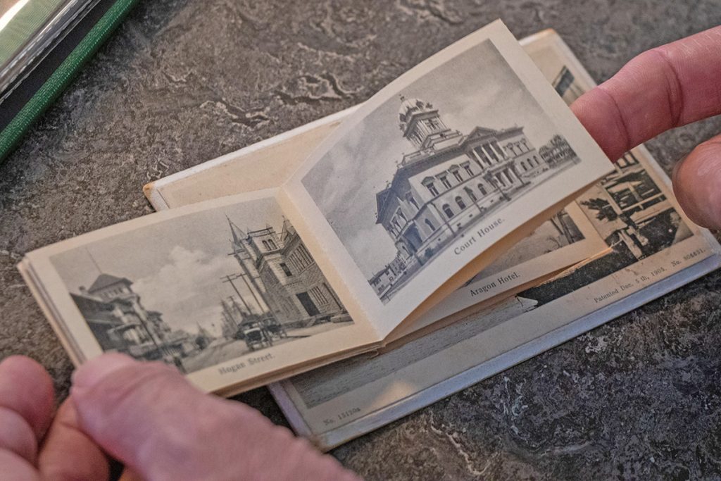 A souvenir mail card featuring various photos of downtown Jacksonville from 1905 is one of more than 2,500 Florida postcards included in the Florida Collection.