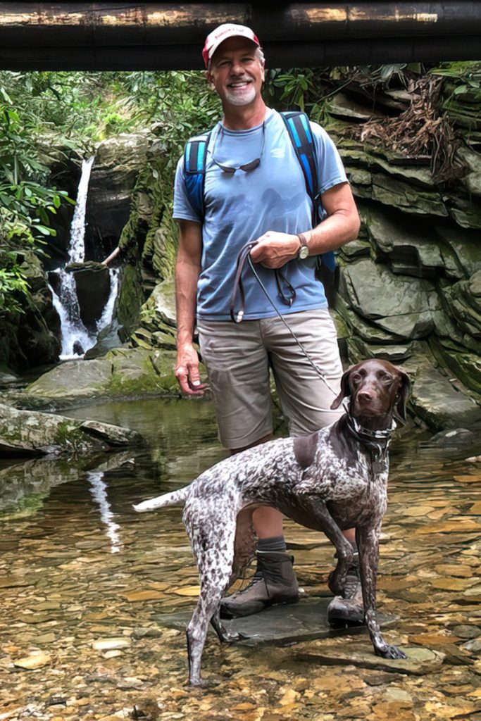 Brooks Andrews hikes with his dog Finn in North Carolina.