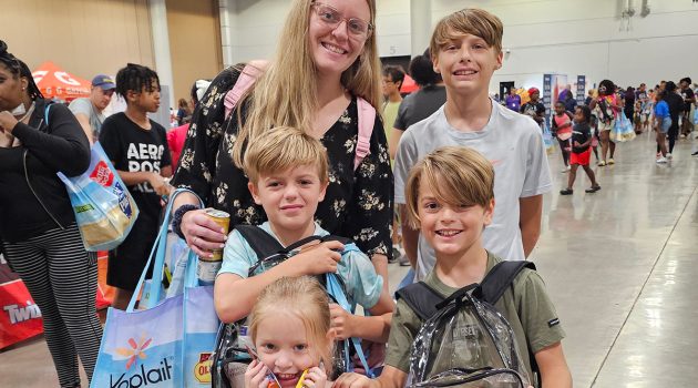 Families pack convention center for Pack the Sack II