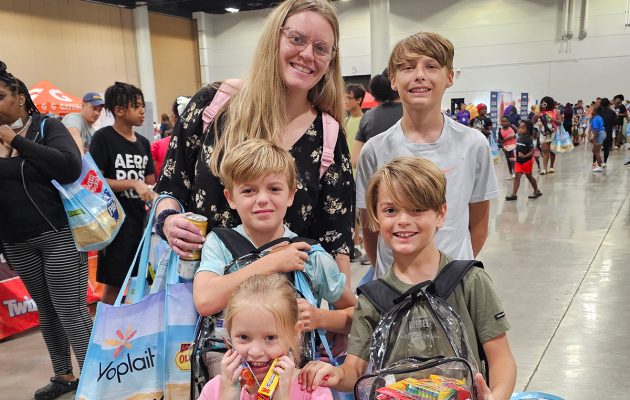 Families pack convention center for Pack the Sack II