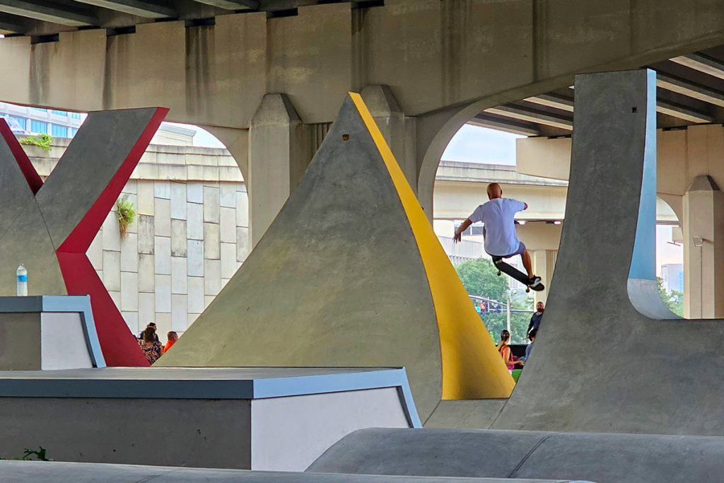 Skater Travis Ochab catches air off the J-A-X ramps at the Artist Walk Skate Park.