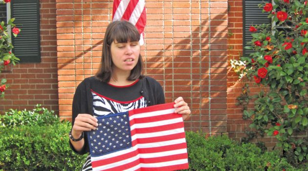DAR presents flag to Nowikowski