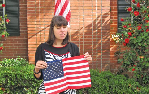 DAR presents flag to Nowikowski
